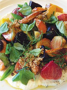 Roasted beets with basil, white bean and Meyer lemon hummus showcase a veg-centric medley with Mediterranean influence.